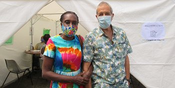 getting vaccinated at local health centre
